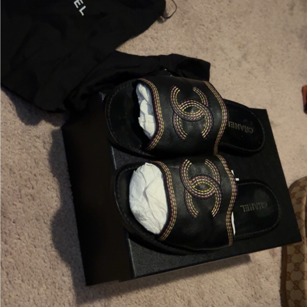 Chanel Black and Gold Slides